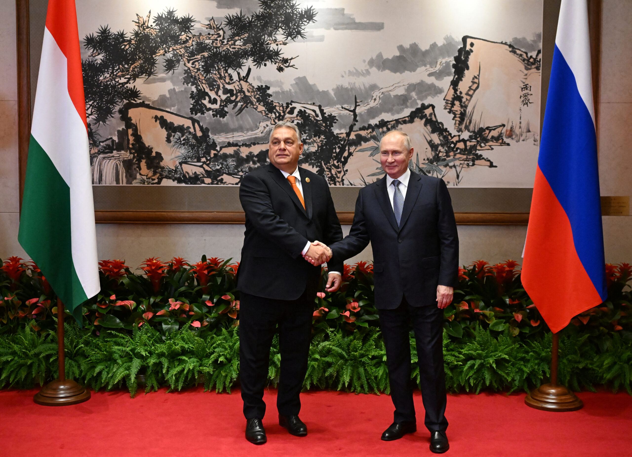 Russian President Putin and Hungarian Prime Minister Orban meet in Beijing.
