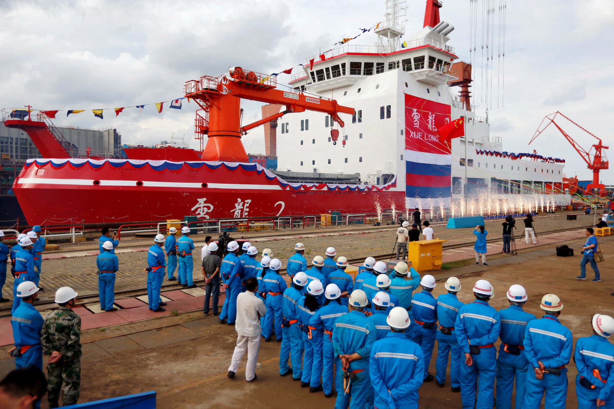 FILE PHOTO: People attend the launch ceremony of China's first domestically built polar icebreaker Xuelong 2, or Snow Dragon 2, at a shipyard in Shanghai, China September 10, 2018. Picture taken September 10, 2018. REUTERS/Stringer