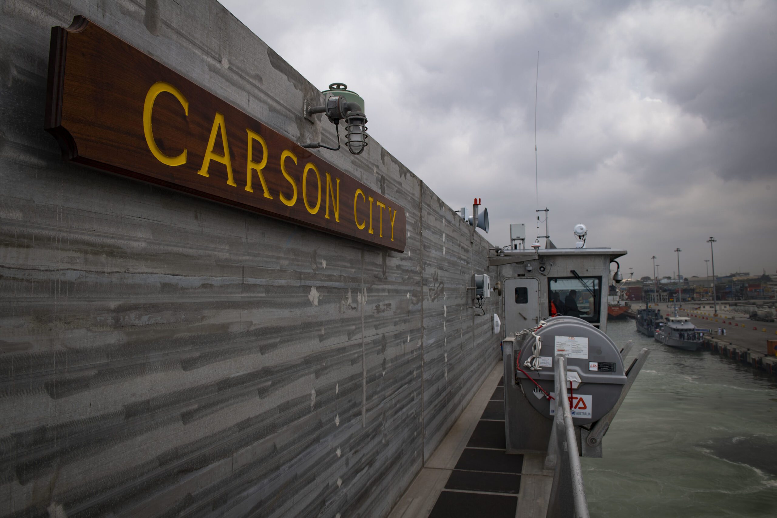 US Naval Ship Carson City docked during a storm