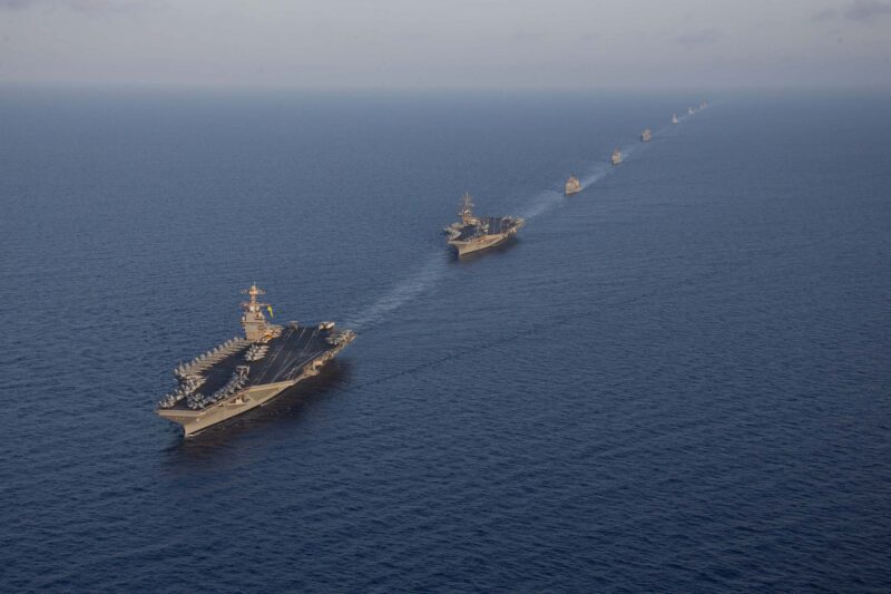 Ships from the Gerald R. Ford and Dwight D. Eisenhower Carrier Strike Groups (CSG) sail in formation in the Mediterranean Sea