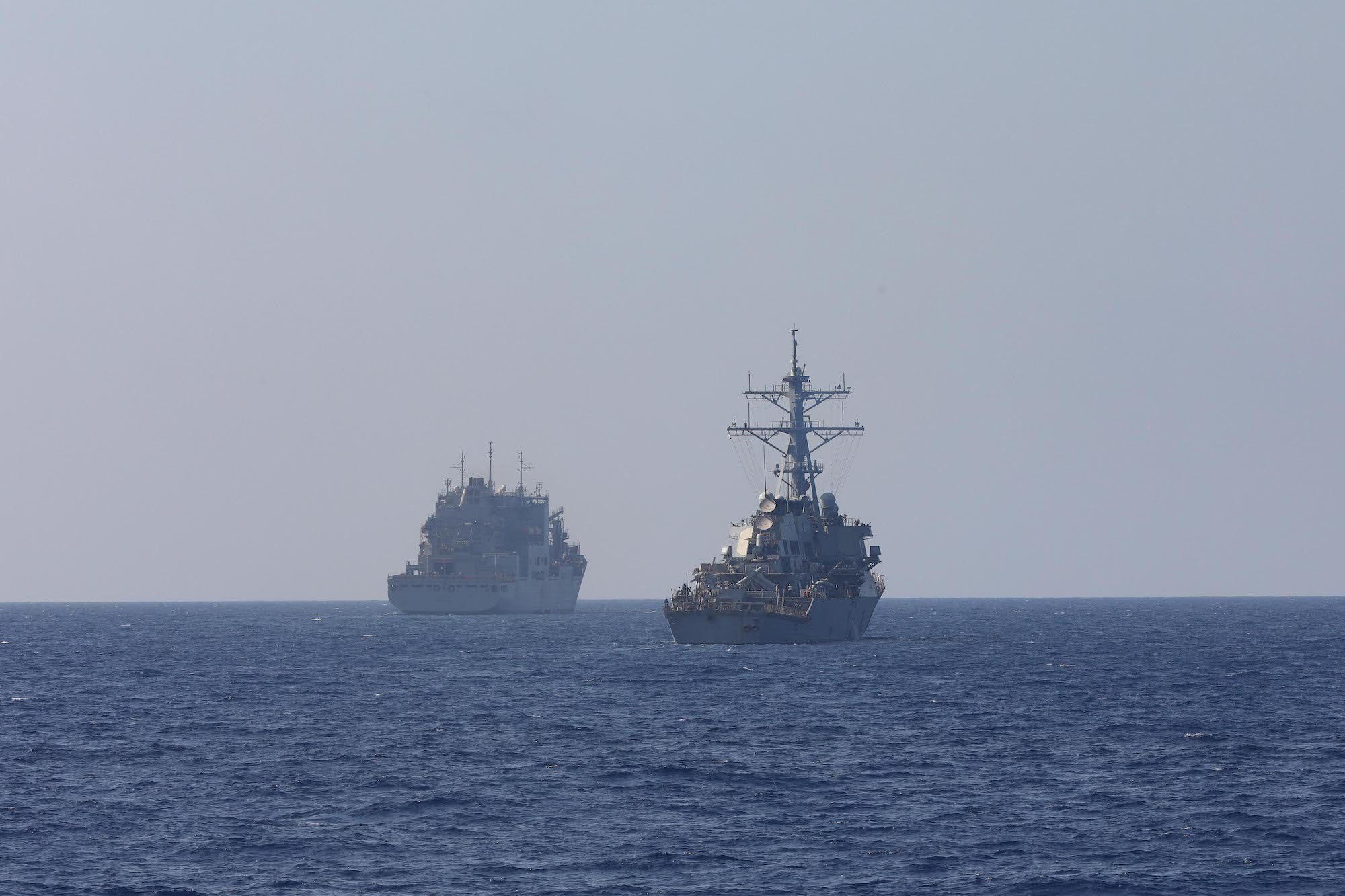 The Arleigh Burke-class guided-missile destroyer USS Carney (DDG 64), right, prepares for an underway replenishment with Lewis and Clark-class dry cargo ship USNS Medgar Evers (T-AKE-13), left, while conducting routine operations in the Eastern Mediterranean Sea, Oct. 16, 2023. U.S. Navy Photo
