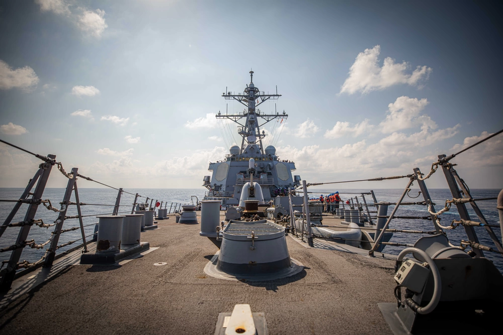 Sailors aboard the Arleigh Burke-class guided-missile destroyer USS Carney (DDG 64) prepare to conduct a replenishment-at-sea with the Lewis and Clark-class dry cargo and ammunition ship USNS Medgar Evers (T-AKE 13), October 12, 2023. MEDITERRANEAN SEA 10.12.2023 Photo by Petty Officer 2nd Class Aaron Lau.