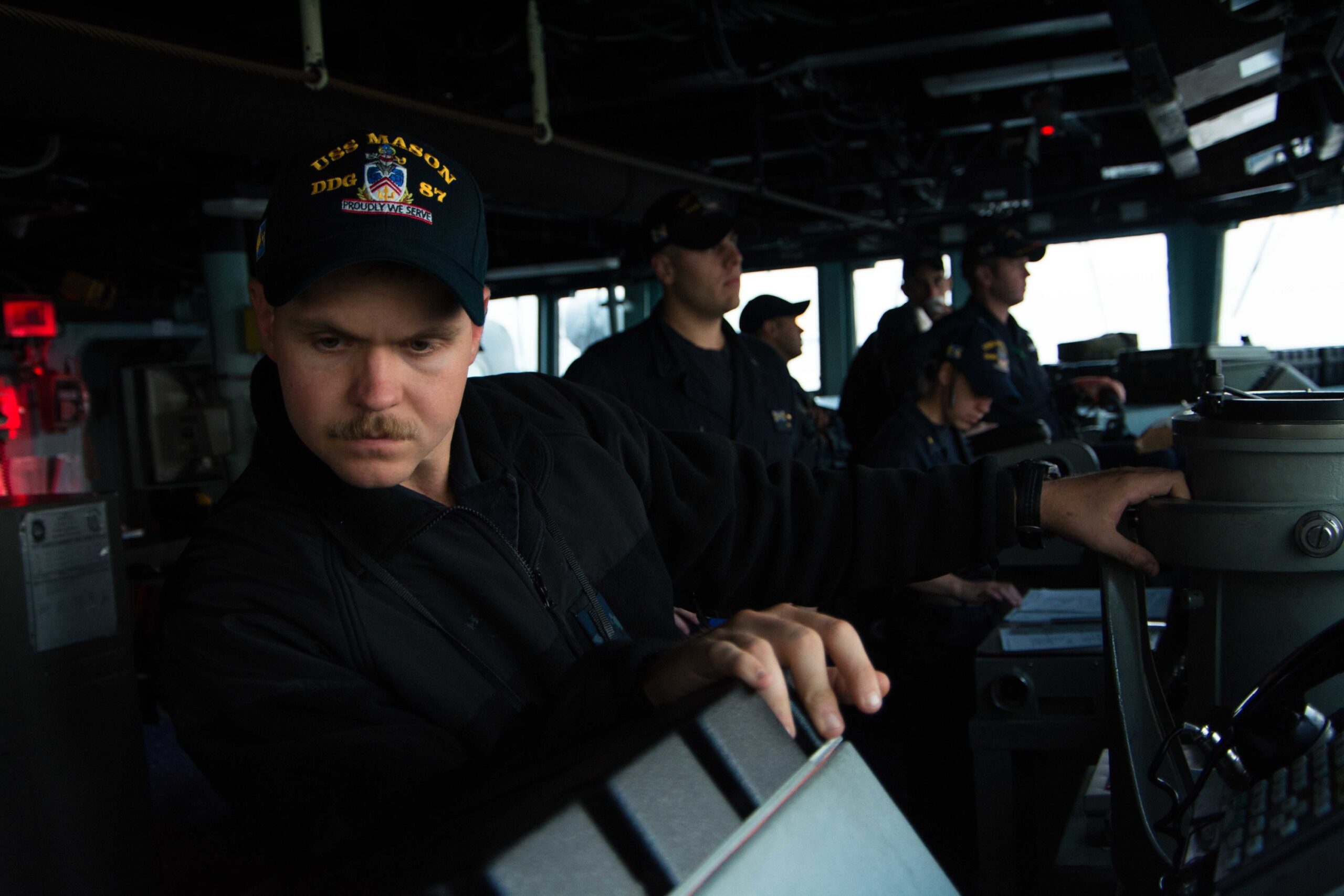 Photo of the bridge team aboard the USS Mason