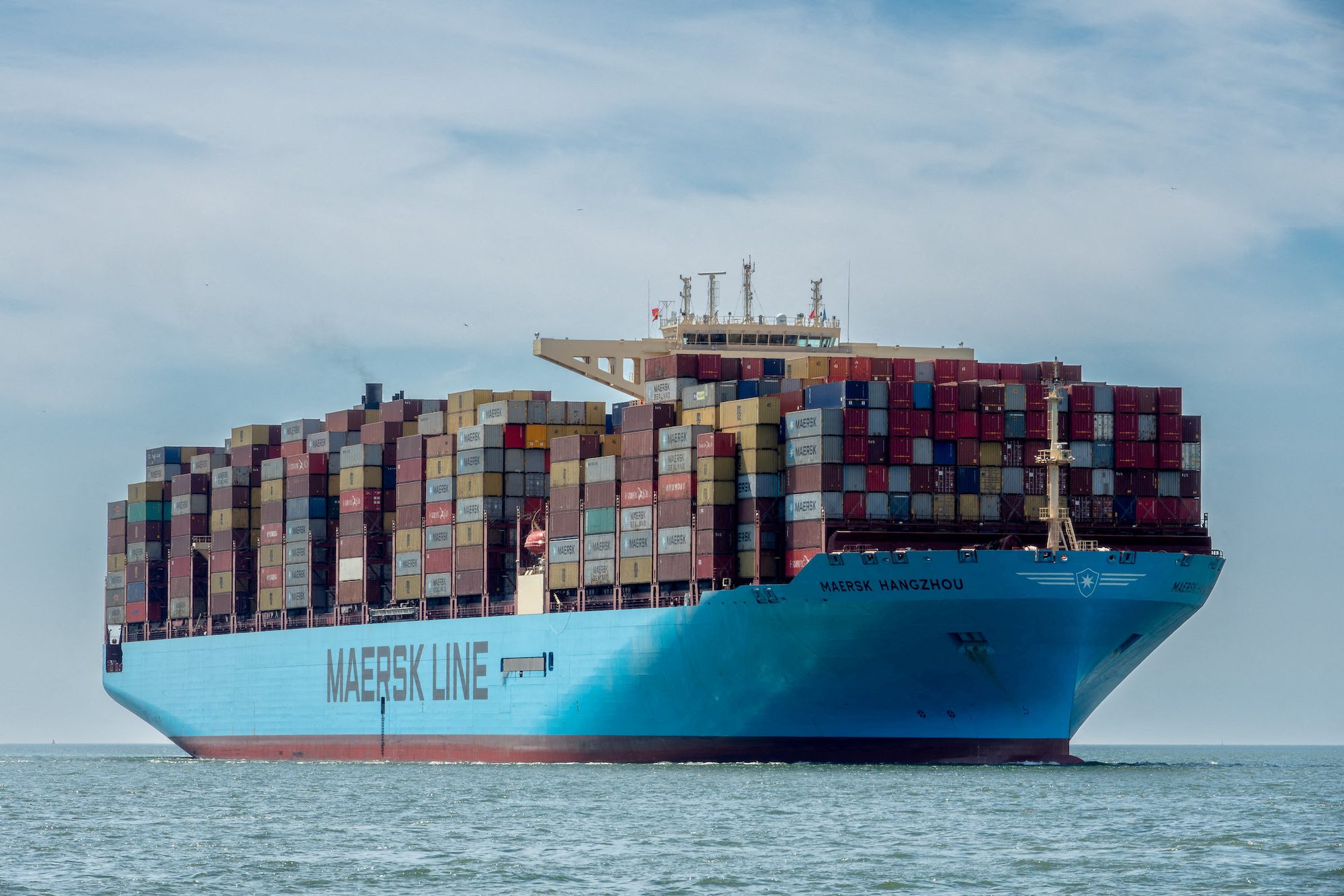 FILE PHOTO: Container vessel Maersk Hangzhou sails in the Wielingen channel, Westerschelde, Netherlands, July 15, 2018. Rene van Quekelberghe/Handout via REUTERS/File Photo