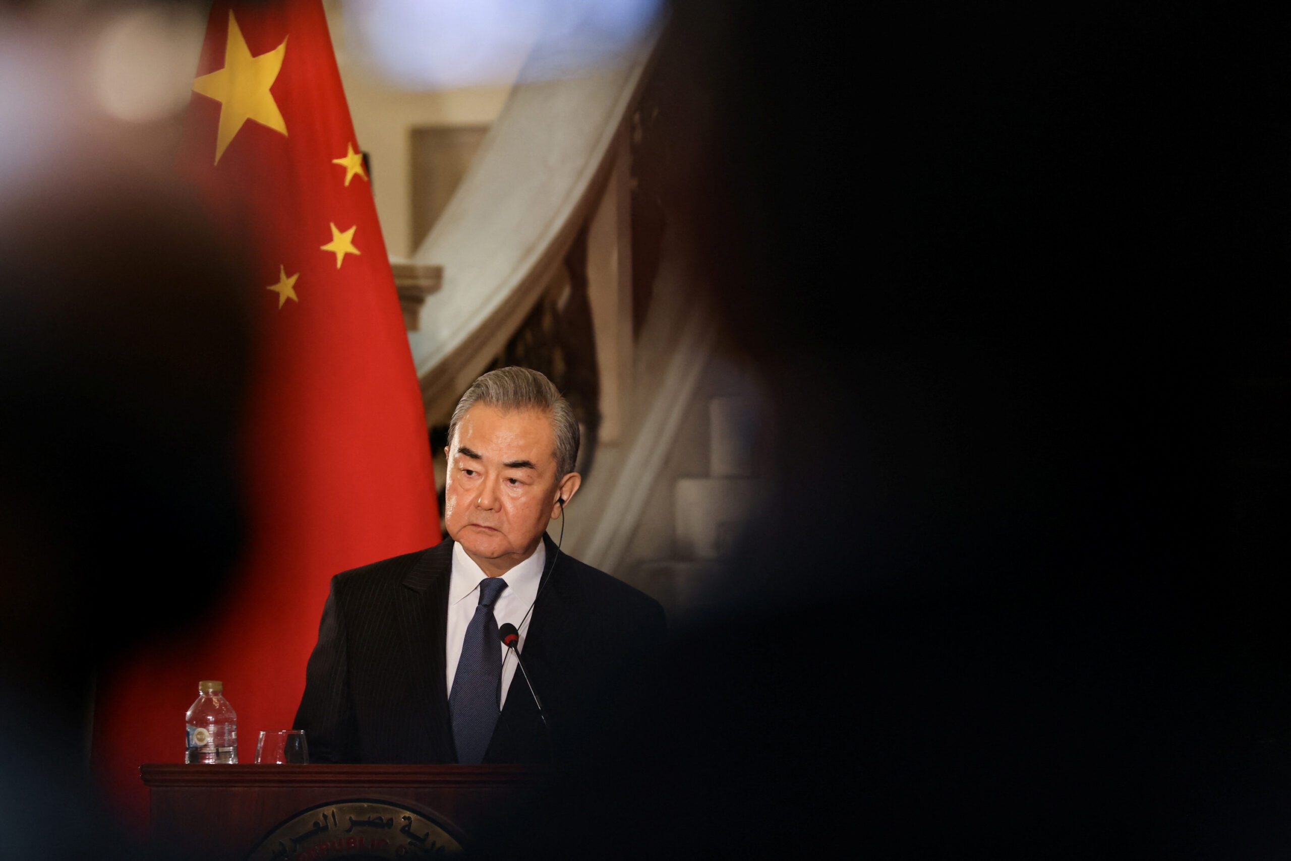 Photo of Chinese Foreign Minister Wang Yi with Chinese flag
