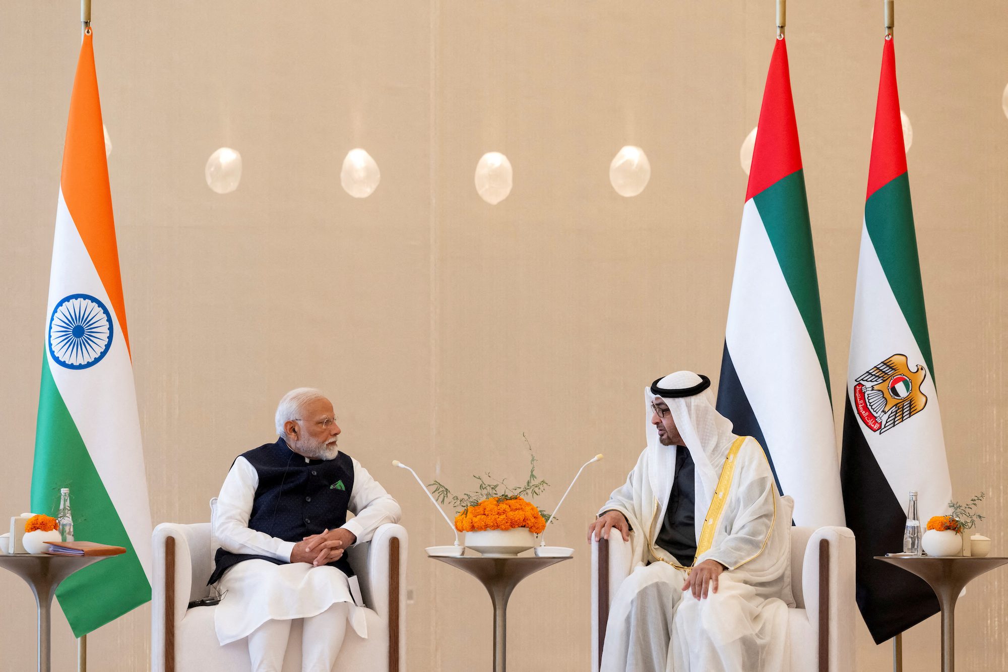 Sheikh Mohamed bin Zayed Al Nahyan, President of the United Arab Emirates, meets with Narendra Modi, Prime Minister of India, during a reception at the Presidential Airport in Abu Dhabi, United Arab Emirates, February 13, 2024. Mohamed Al Hammadi/UAE Presidential Court/Handout via REUTERS