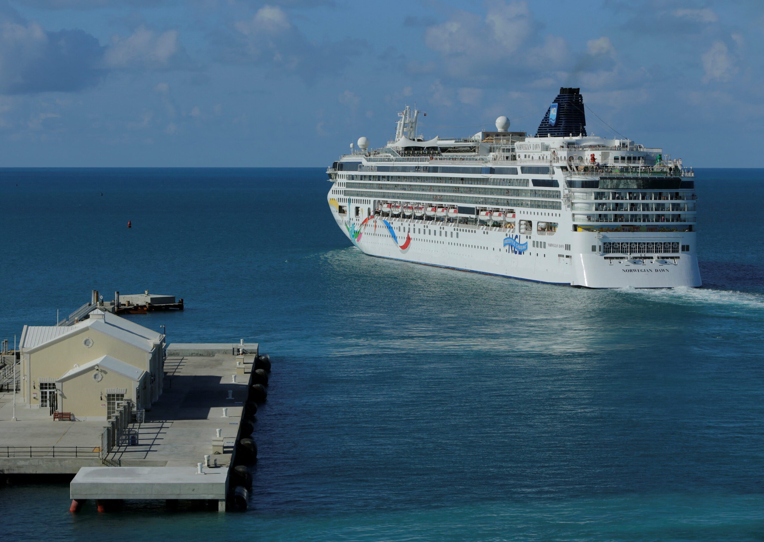 Cruise ship Norwegian Dawn departs port near Hamilton Bermuda. REUTERS/Gary Cameron (BERMUDA)