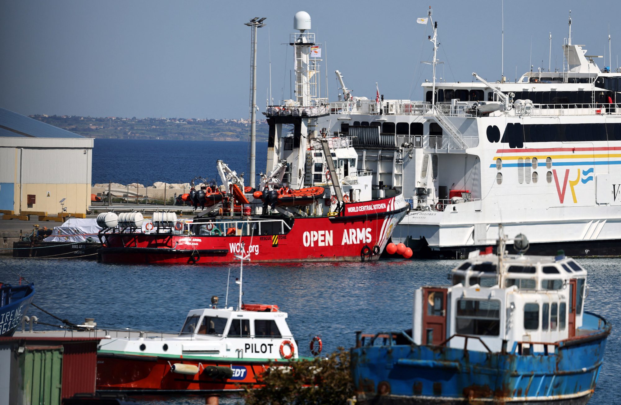 Humanitarian aid for Gaza is loaded on a platform next to a rescue vessel of the Spanish NGO Open Arms at the port of Larnaca, Cyprus March 11, 2024. REUTERS/Yiannis Kourtoglou