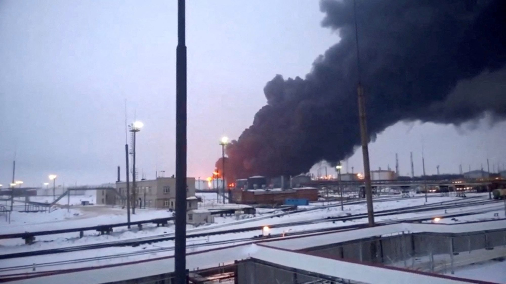 Smoke billows after Ukraine's SBU drone strikes a refinery, amid Russia's attack on Ukraine, in Ryazan, Ryazan Region, Russia, in this screen grab from a video obtained by Reuters, March 13, 2024. Video Obtained By Reuters/via REUTERS