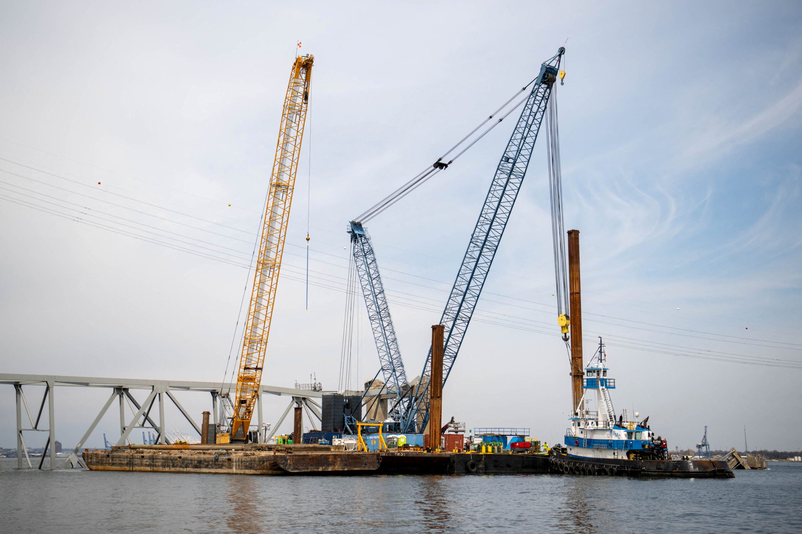 Barge cranes are shown near the collapsed Francis Scott Key Bridge in Baltimore. U.S. Coast Guard/Petty Officer 2nd Class Taylor Bacon/Handout via REUTERS