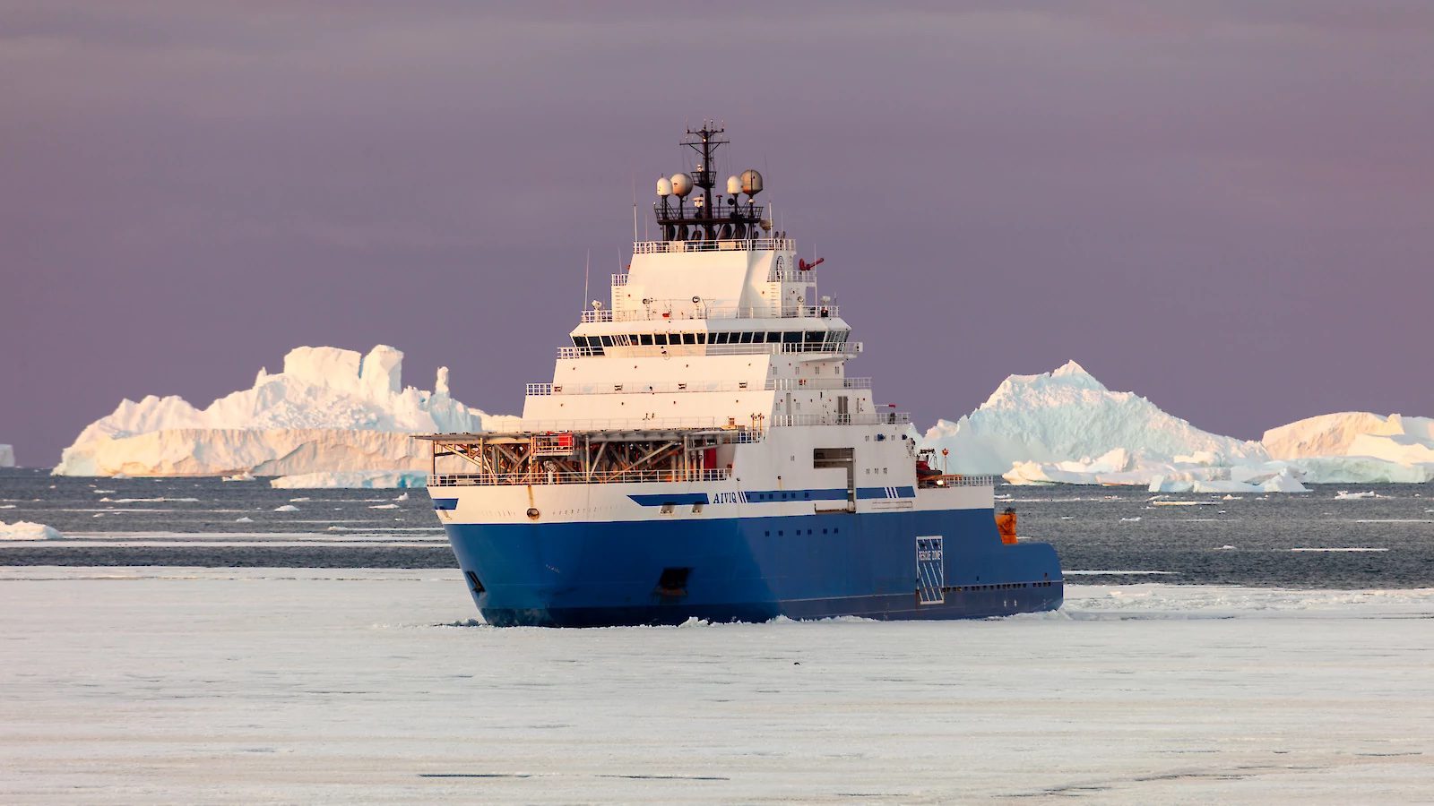 The icebreaker Aiviq completing refuelling operations at Davis Research Station. Photo: Kirk Yatras via Australian Antarctic Division