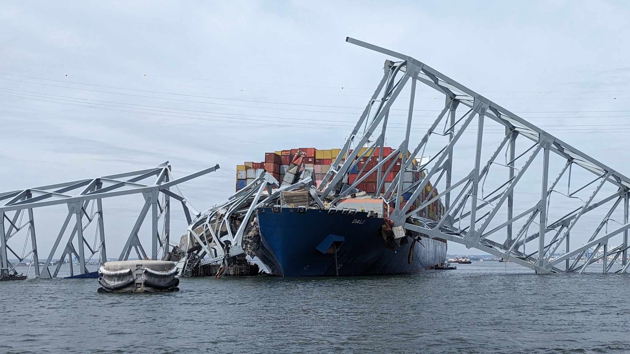U.S. Army Corps of Engineers staff onboard Hydrographic Survey Vessel CATLETT observe the damage resulting from the collapse of the Francis Scott Key Bridge in Baltimore, March 26, 2024. USACE Photo