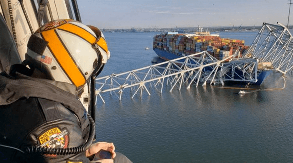 Responders with the Unified Command conduct an overflight assessment of the Francis Scott Key Bridge collapse in Baltimore, Maryland, March 29, 2024. The Key Bridge was struck by the Singapore-flagged cargo ship Dali early morning on March 26, 2024. (Unified Command courtesy photo)