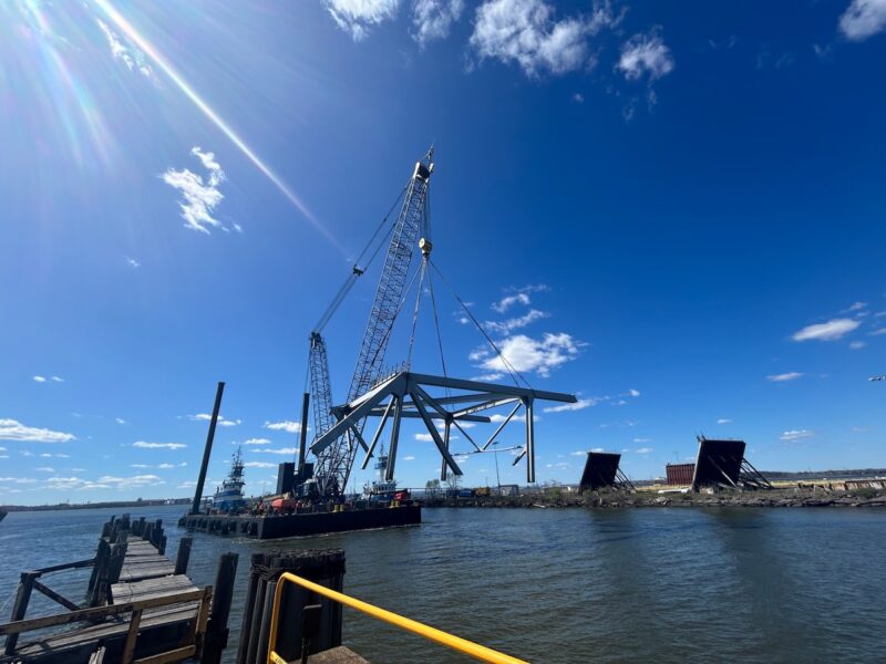Salvage crews operating with the Key Bridge Response 2024 Unified Command move a section of Francis Scott Key Bridge to Sparrows Point in Baltimore, April 7, 2024.