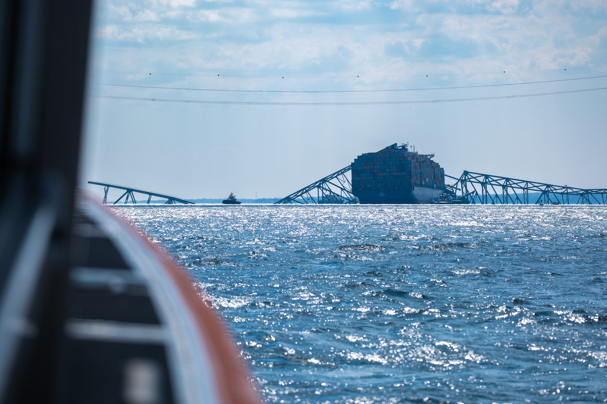 A Coast Guard Station Milford Haven 29-foot Response Boat-Small boat crew assesses the Francis Scott Key Bridge collapse in Baltimore, Maryland, March 29, 2024. U.S. Coast Guard Photo