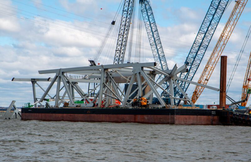 Response personnel prepare debris from the Francis Scott Key Bridge for removal from the Patapsco River, April 6, 2024. The Unified Command is working to restore flow of critical commerce in and out of Baltimore. Key Bridge Response 2024 Unified Command photo via USACE