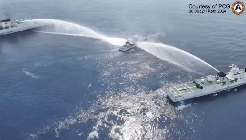 Screenshot of video from the Philippines Coast Guard shows Chinese Coast Guard vessels using water cannons against a Philippine Coast Guard vessel near the Scarborough Shoal, April 30, 2024. Philippine Coast Guard Image