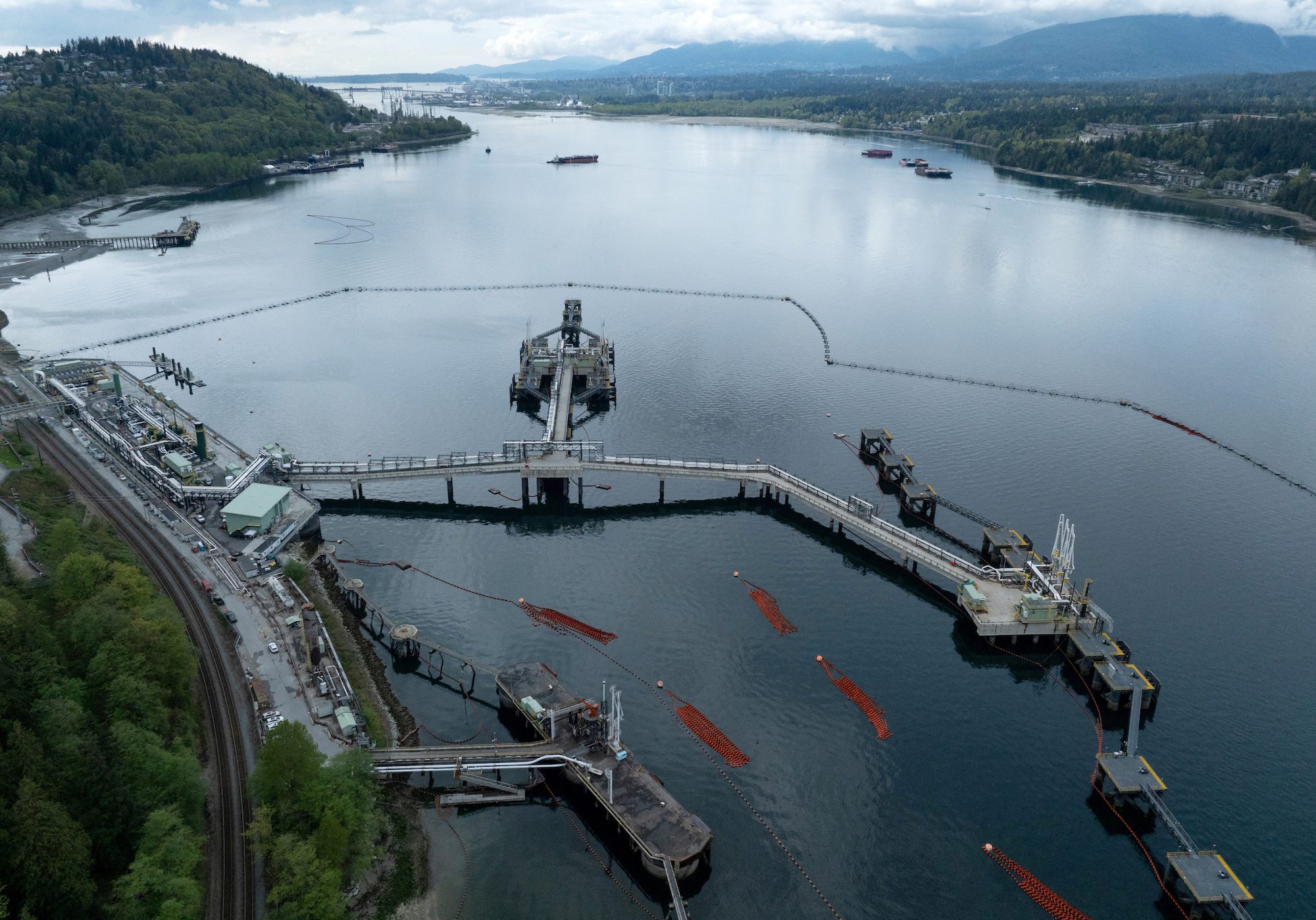 FILE PHOTO: A drone view of three berths able to load vessels with oil is seen after their construction at Westridge Marine Terminal, the terminus of the Canadian government-owned Trans Mountain pipeline expansion project in Burnaby, British Columbia, Canada, April 26, 2024. REUTERS/Chris Helgren/File Photo