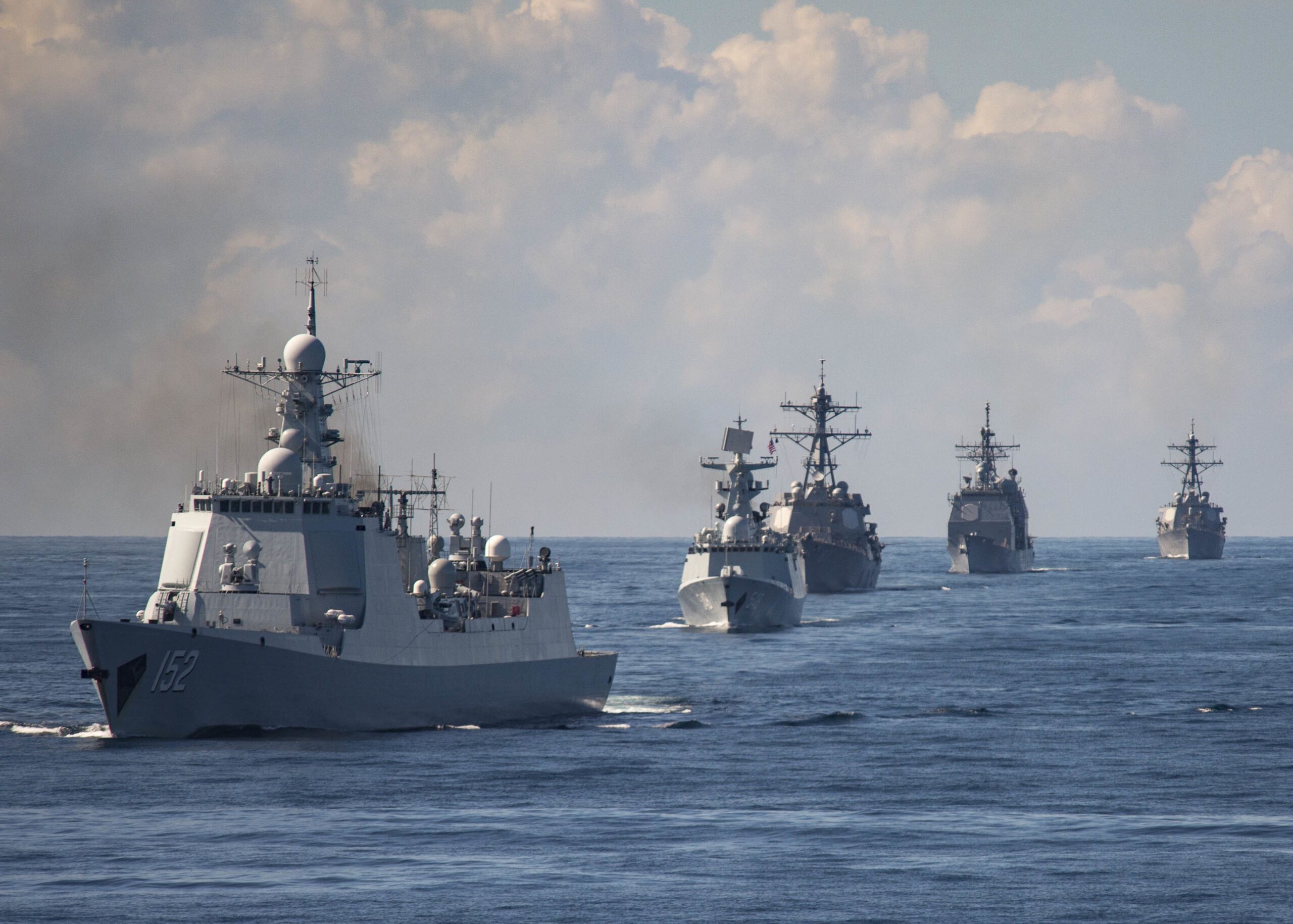 US Navy and Chinese PLAN Navy warships sailing together in formation