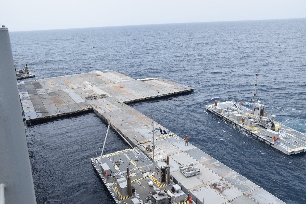 U.S. Army soldiers and sailors attached to the MV Roy P. Benavidez assemble the roll-on, roll-off pier off the coast of Gaza, April 26, 2024. U.S. Army photo