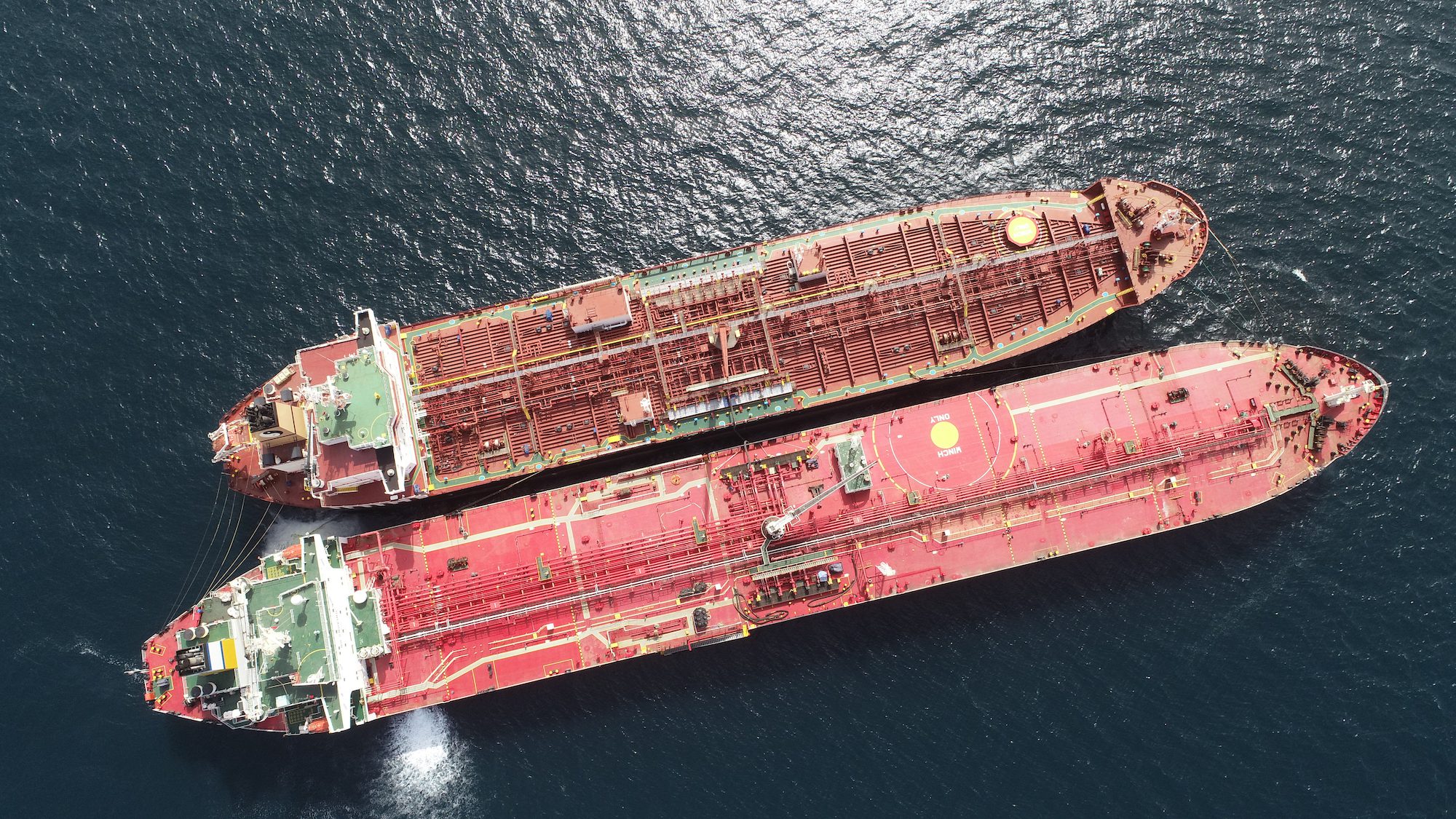 Stock photo of a ship-to-ship transfer between two tankers from above