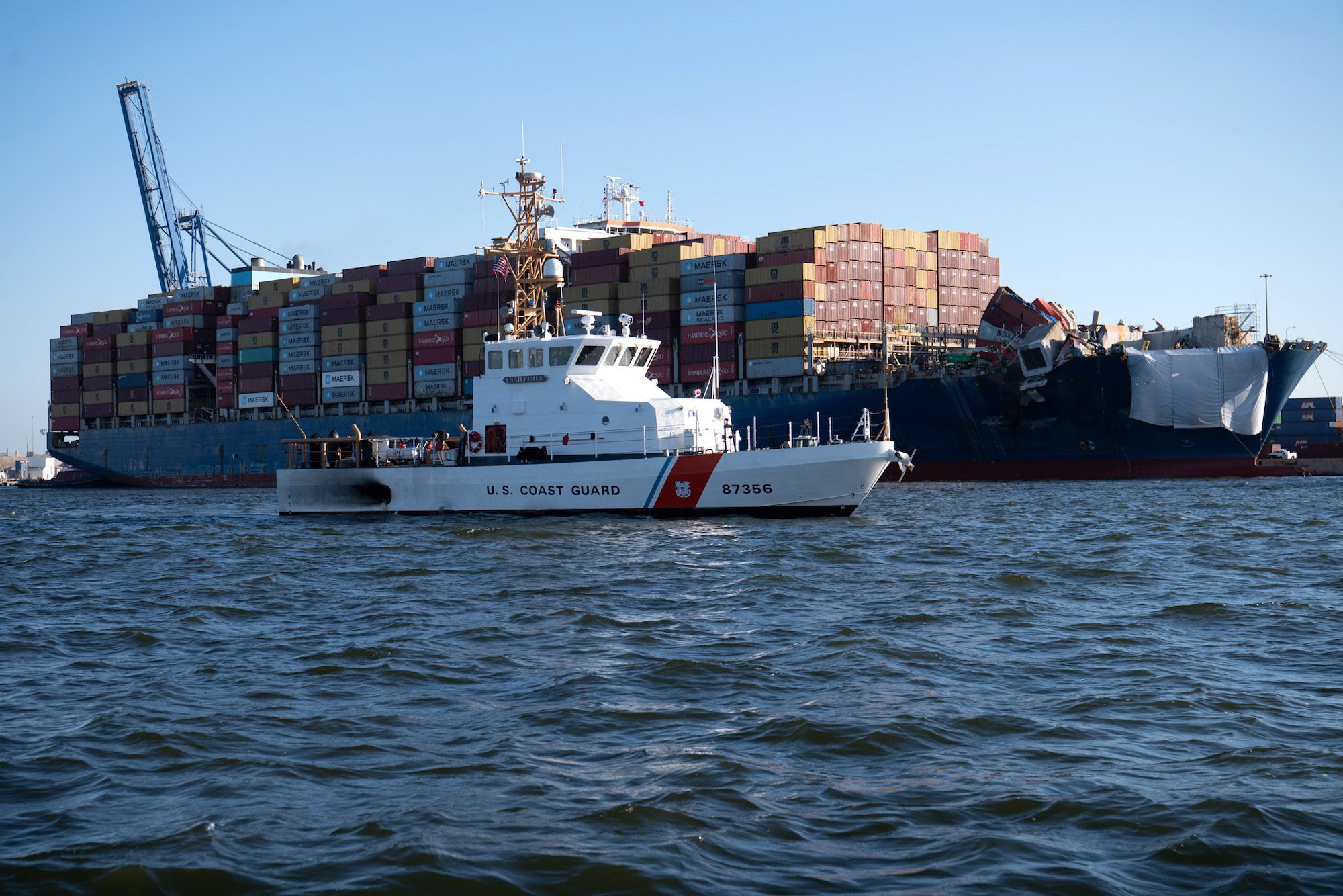 The crew of the U.S. Coast Guard Cutter Sailfish, an 87-foot Marine Protector class vessel, prepares to escort the Motor Vessel Dali during its transit from the Port of Baltimore to the Port of Virginia, June 24, 2024. U.S. Coast Guard Photo