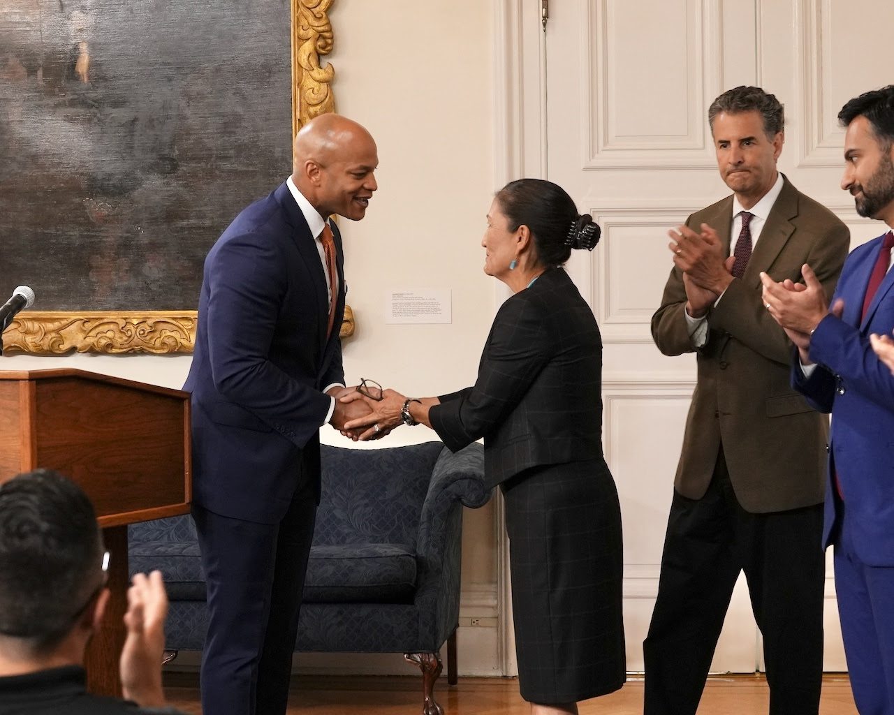 Governor Wes Moore shakes hands with Secretary of the Interior Deb Haaland