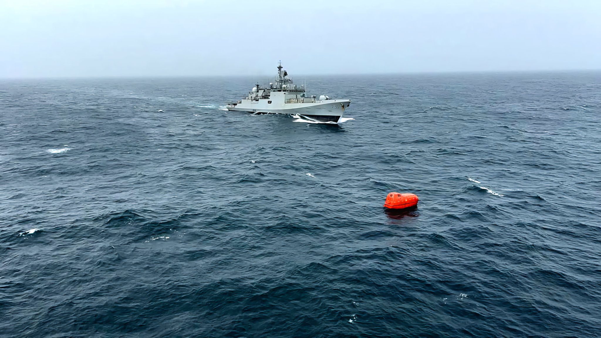 The Indian Navy frigate INS Teg approaches a lifeboat containing nine crew members from the MT Prestige Falcon, July 17, 2024. Photo courtesy Indian Navy