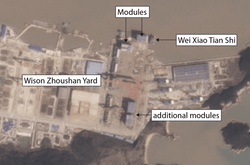 Wei Xiao Tian Shi at the Wison Zhoushan yard on March 20, 2024 loading the second of two modules for Arctic LNG 2  while two additional modules remain at the yard. (Source: Planet.com)
