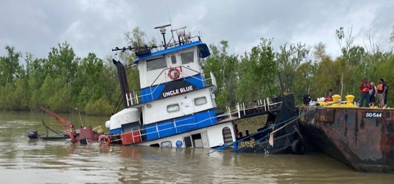 Uncle Blue tug partially sunken