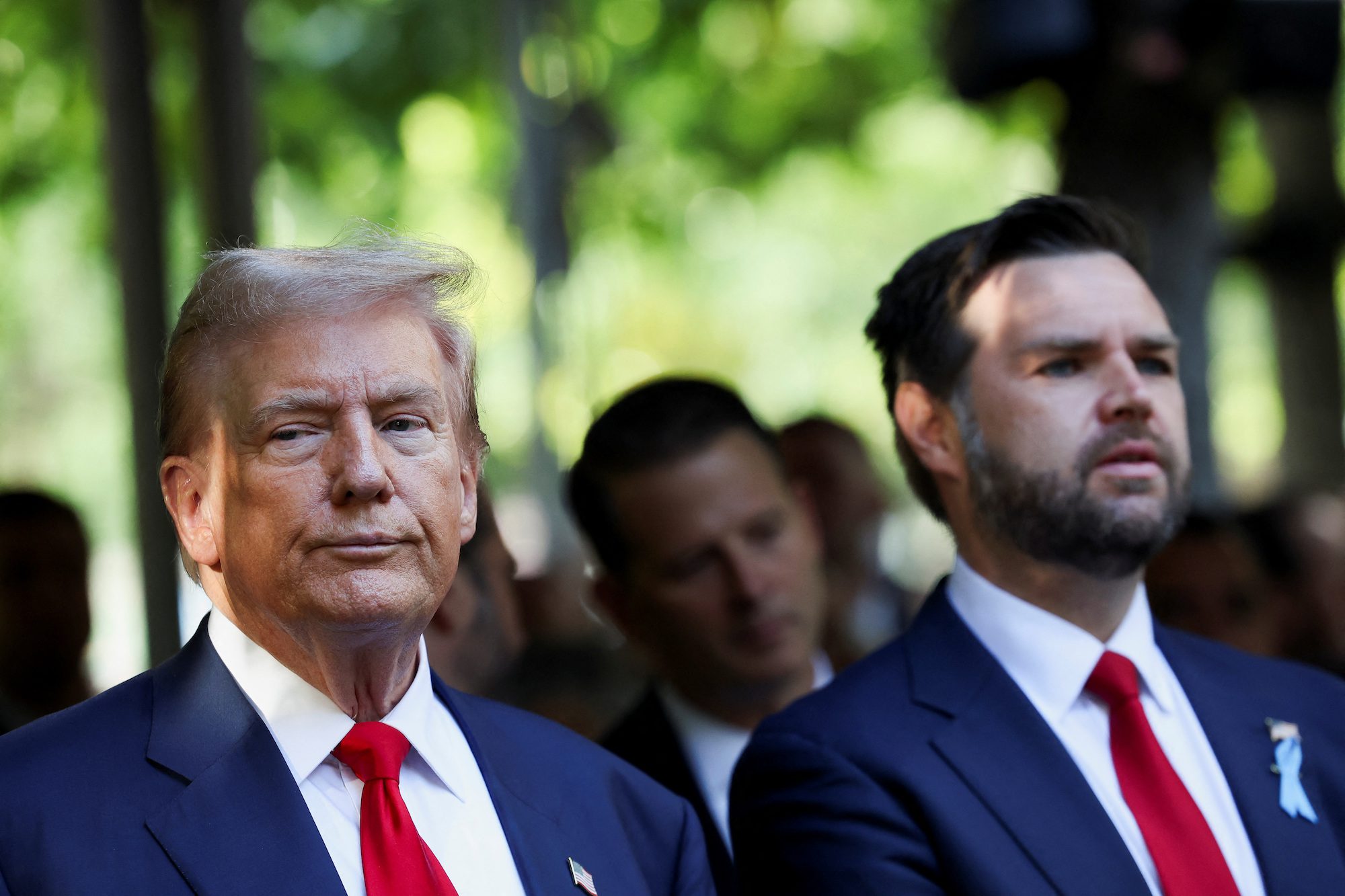 Republican presidential nominee and former U.S. President Donald Trump and Republican U.S. vice presidential nominee Senator JD Vance attend a ceremony marking the 23rd anniversary of the September 11, 2001 attacks on the World Trade Center at the 9/11 Memorial and Museum in the Manhattan borough of New York City, U.S., September 11, 2024. REUTERS/Mike Segar