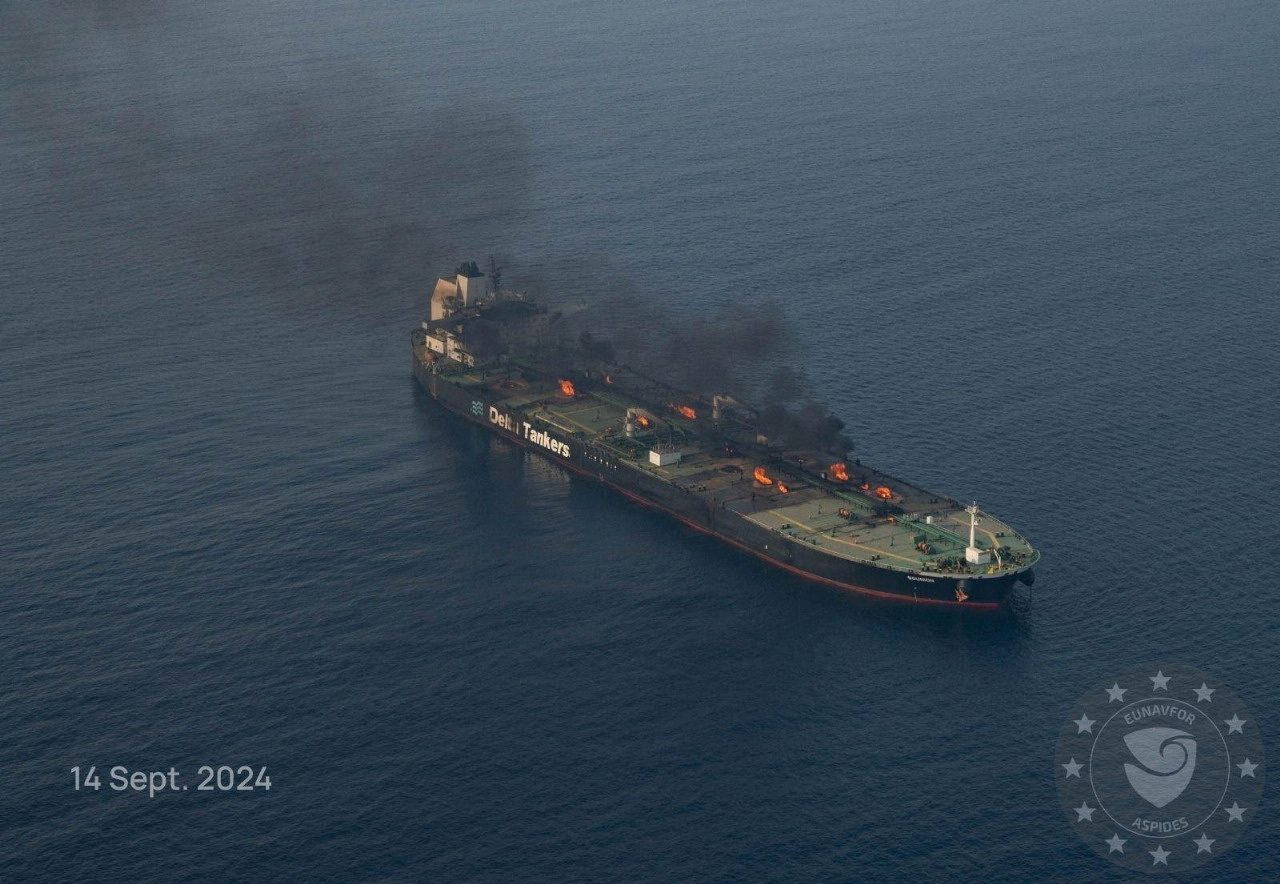 FILE PHOTO: Flames and smoke rise from the Greek-flagged oil tanker Sounion, which has been on fire since August 23, after an attack by Houthi militants, on the Red Sea, September 14, 2024 in this handout image. EUNAVFOR ASPIDES/Handout via REUTERS