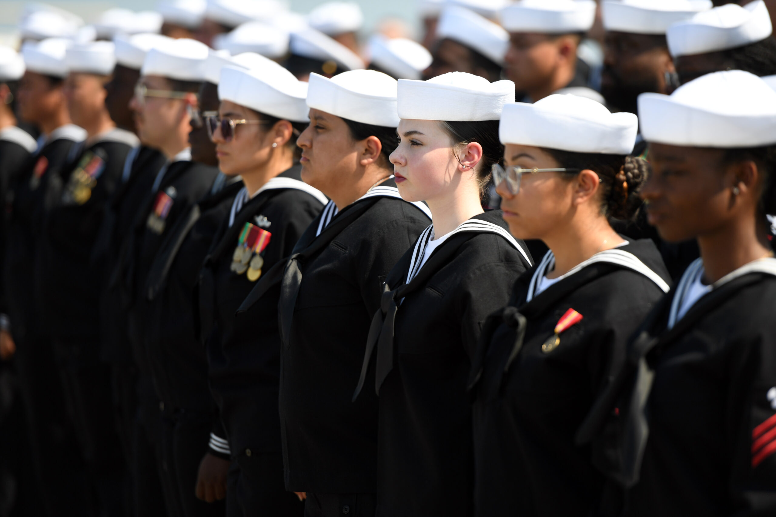 Sailors assigned to USS New Jersey (SSN 796) stand by to man their ship during a commissioning ceremony at Naval Weapons Station Earle, New Jersey on September 14, 2024. U.S. Navy Photo