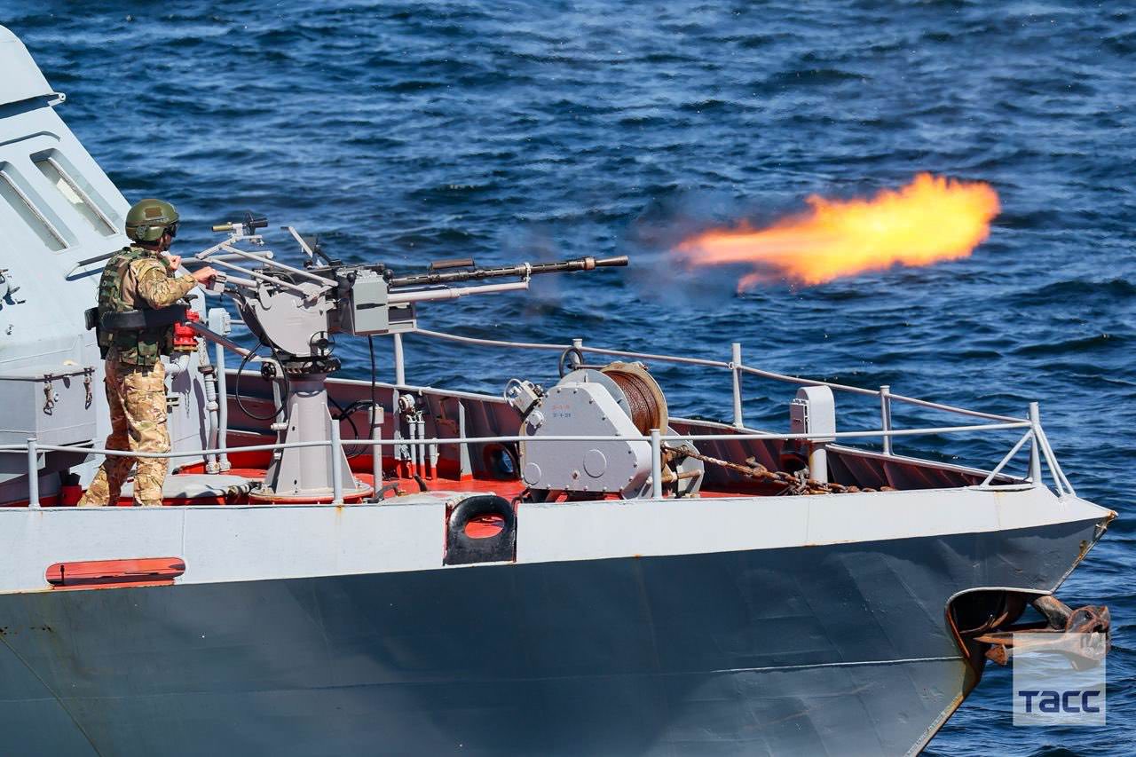 Russian navy ship shooting automatic deck mounted weapon