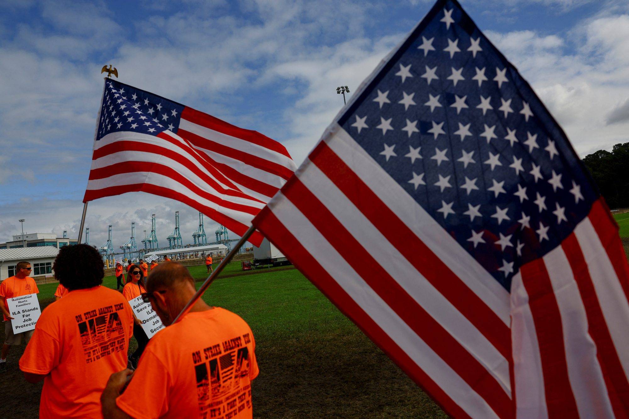 Port workers from the International Longshoremen's Association (ILA) participate in a strike at the Virginia International Gateway in Portsmouth, Virginia, U.S., October 2, 2024. REUTERS/Jose Luis Gonzalez