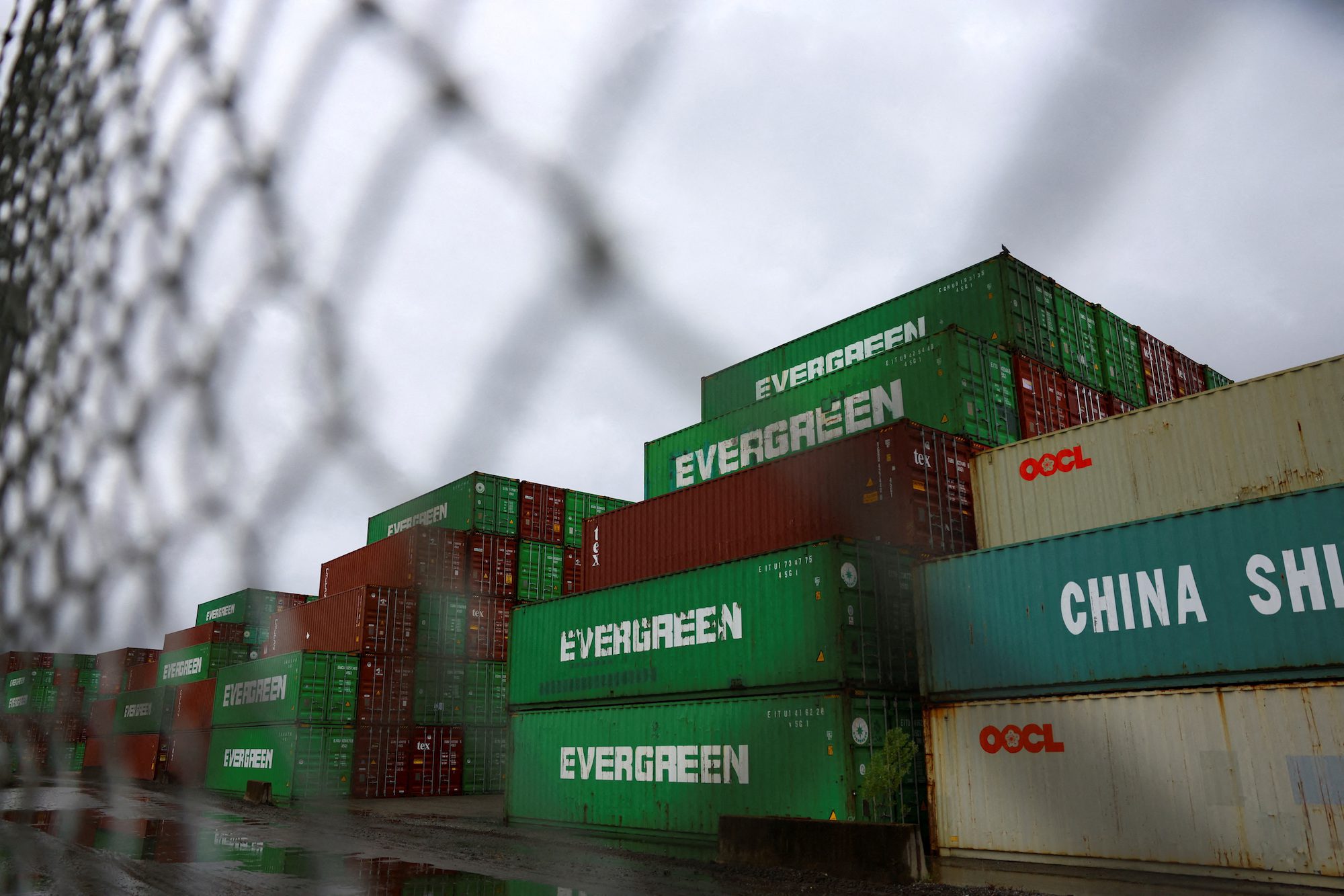 FILE PHOTO: Containers are seen stacked in Portsmouth Marine Terminal (PMT), as port workers from the International Longshoremen's Association (ILA) participate in a strike, in Portsmouth, Virginia, U.S., October 1, 2024. REUTERS/Jose Luis Gonzalez/File Photo