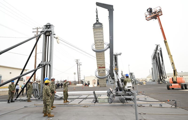 Navy missile reloading at sea equipment being tested on land