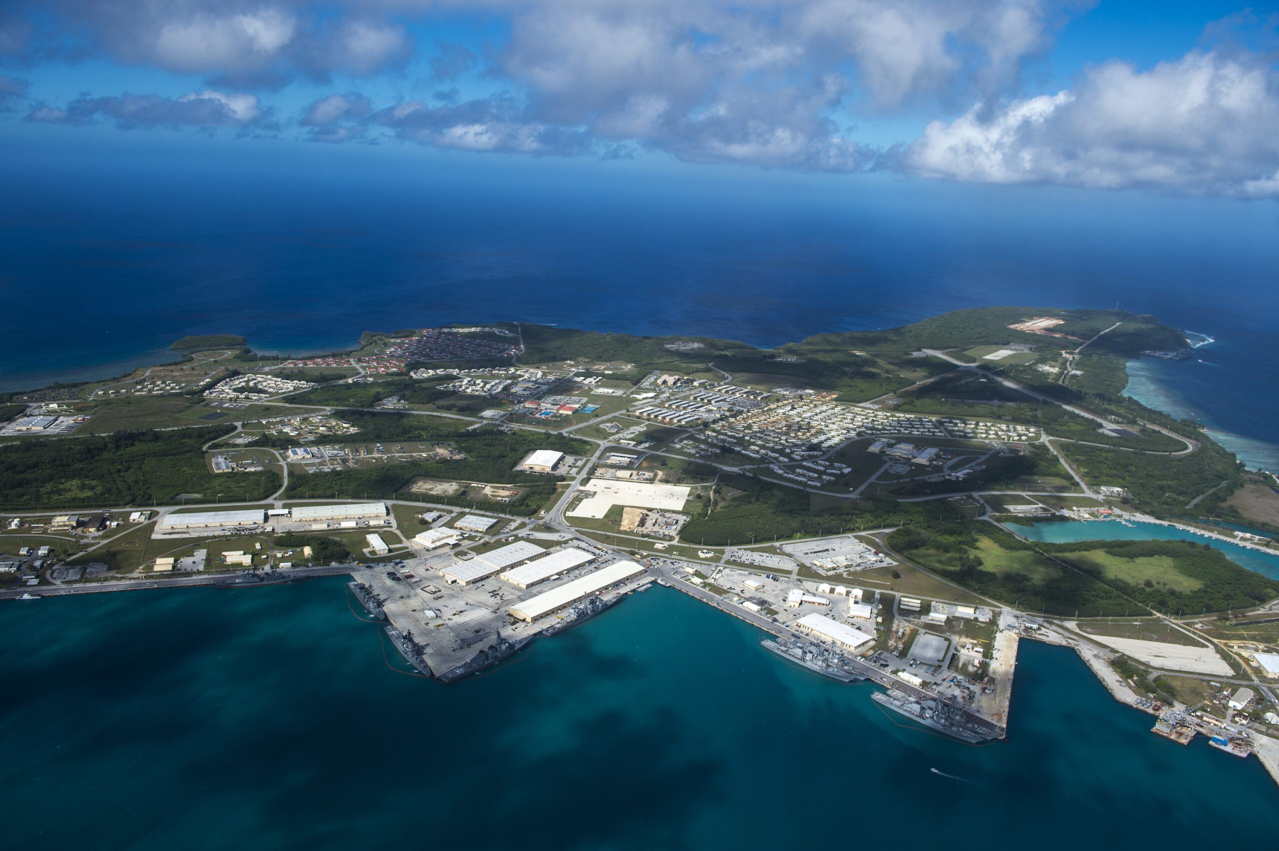 aerial photo of the US Navy base in Guam on a clear day with some clouds