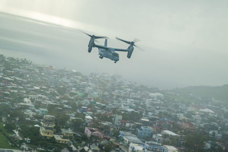 A U.S. Marine Corps MV-22B Osprey attached to Marine Medium Tiltrotor Squadron (VMM) 165 (Reinforced), 15th Marine Expeditionary Unit, flies over Batanes Province, Philippines, while supporting foreign disaster relief operations, Oct. 8, 2024.