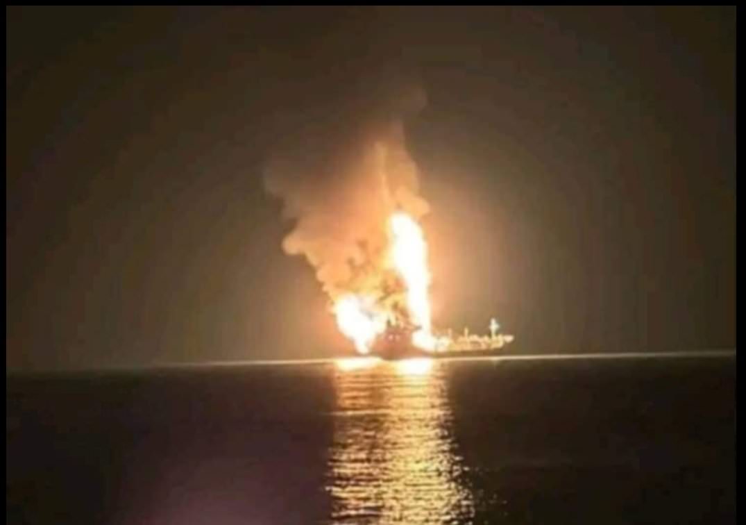 ship on fire at night after LPG explosion