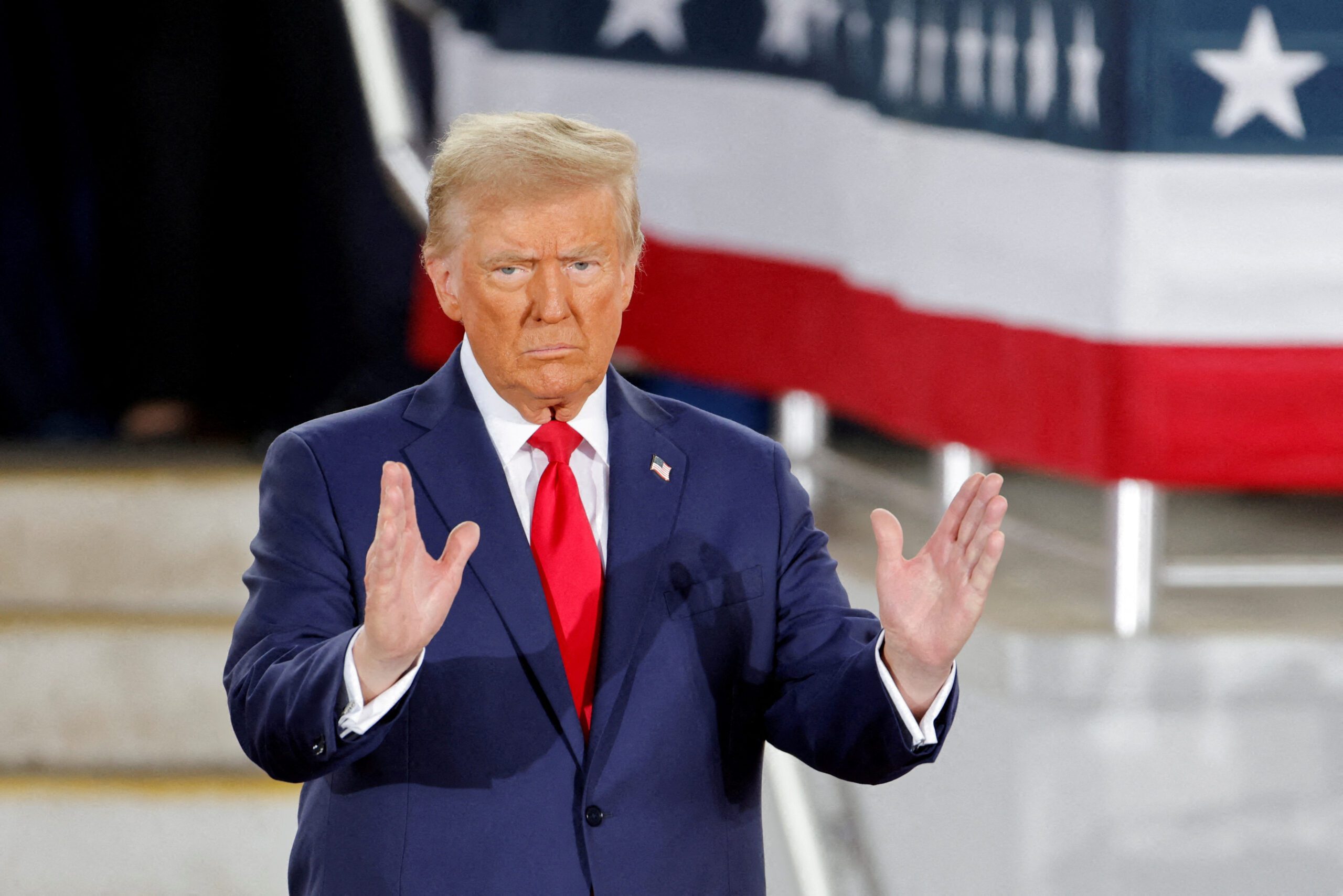 Republican presidential nominee and former U.S. President Donald Trump gestures during a campaign event at Dorton Arena, in Raleigh, North Carolina