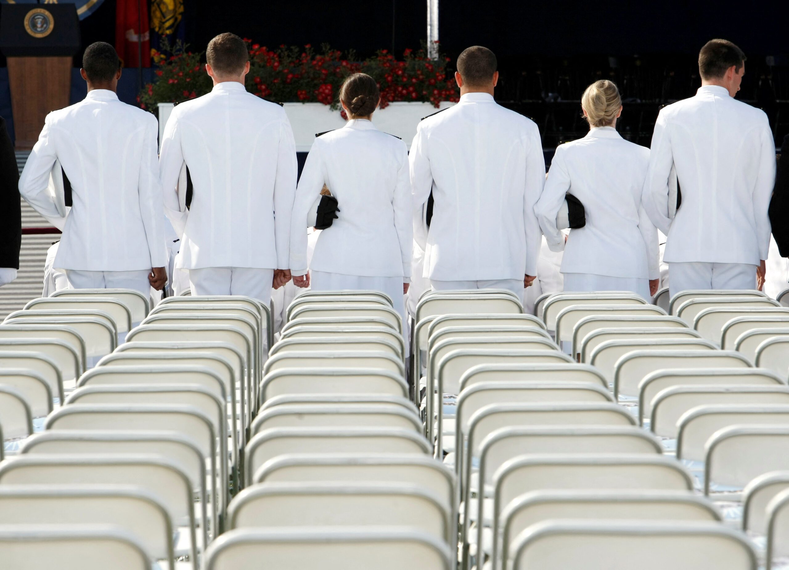 Midshipmen take their seats in the the stadium for their graduation and commissioning ceremonies at the U.S. Naval Academy in Annapolis May 22, 2009. REUTERS/Kevin Lamarque/