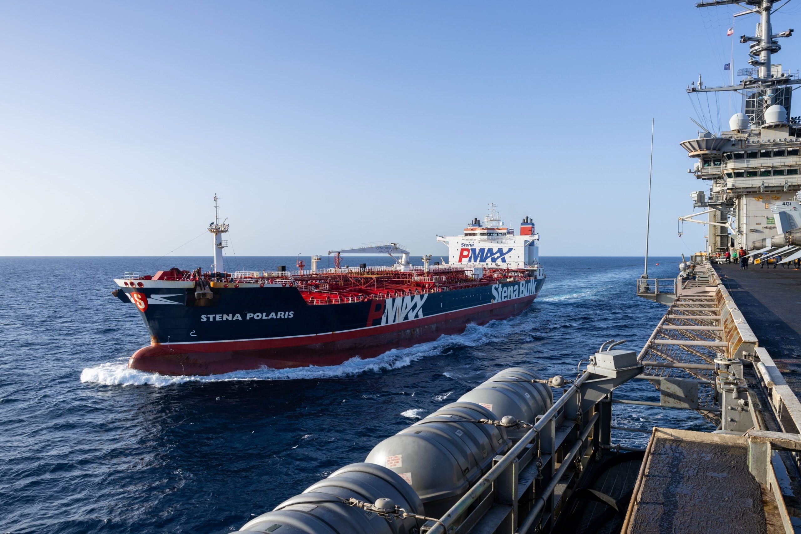 The crude oil tanker Stena Polaris sails alongside the Nimitz-class aircraft carrier USS Harry S. Truman (CVN 75) during a replenishment-at-sea, Nov. 26, 2024.