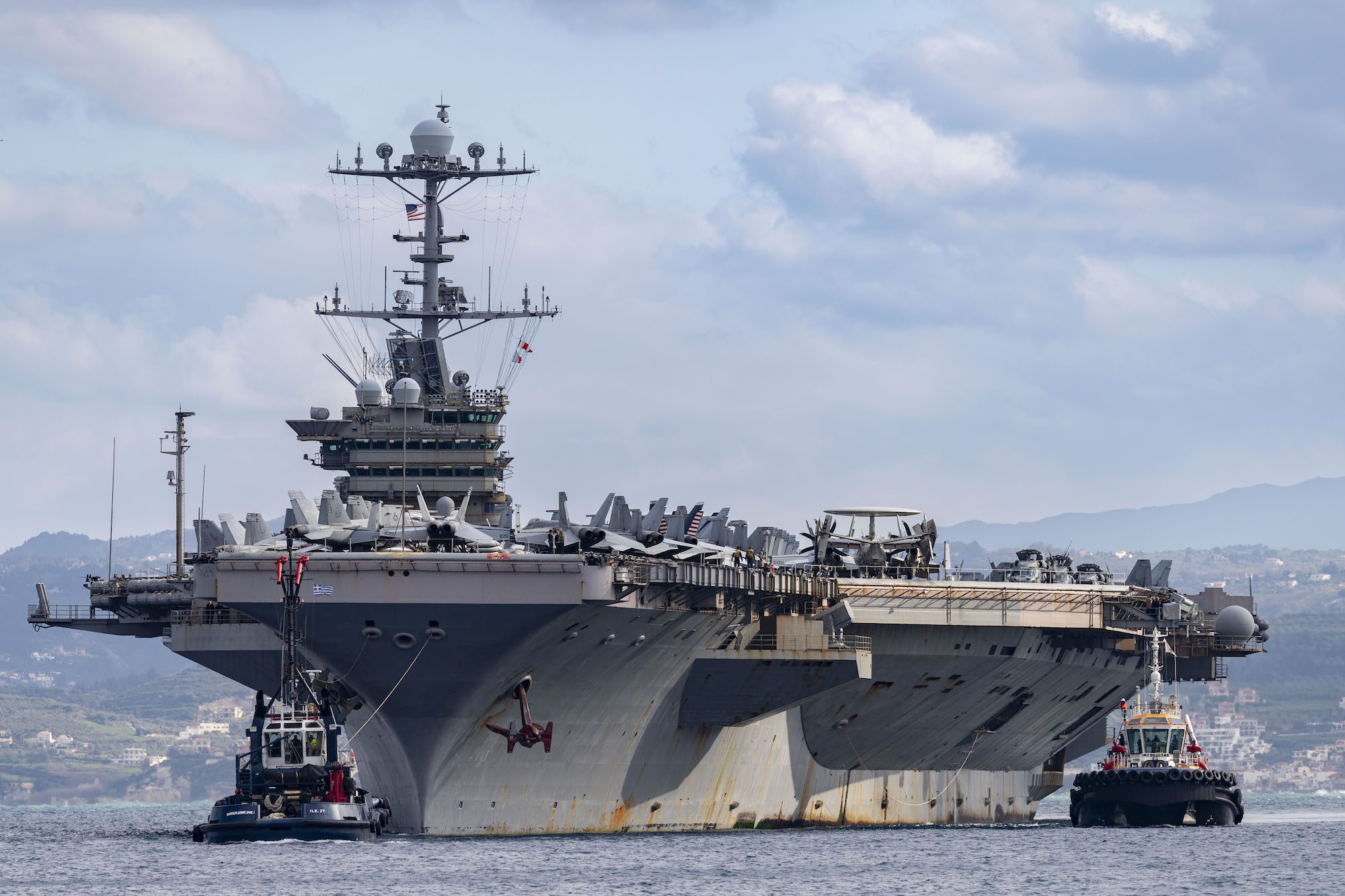 The Nimitz-class aircraft carrier USS Harry S. Truman (CVN 75) arrives at the NATO Marathi Pier Complex in Souda Bay, Crete, Greece, during a scheduled port visit on Feb. 6, 2025