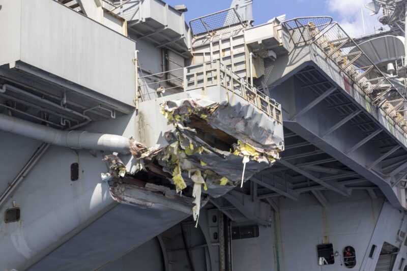 Exterior damage of USS Harry S. Truman (CVN 75) viewed from a ship’s rigid-hull inflatable boat following a collision with merchant vessel Besiktas-M, Feb. 12, while operating in the vicinity of Port Said, Egypt.