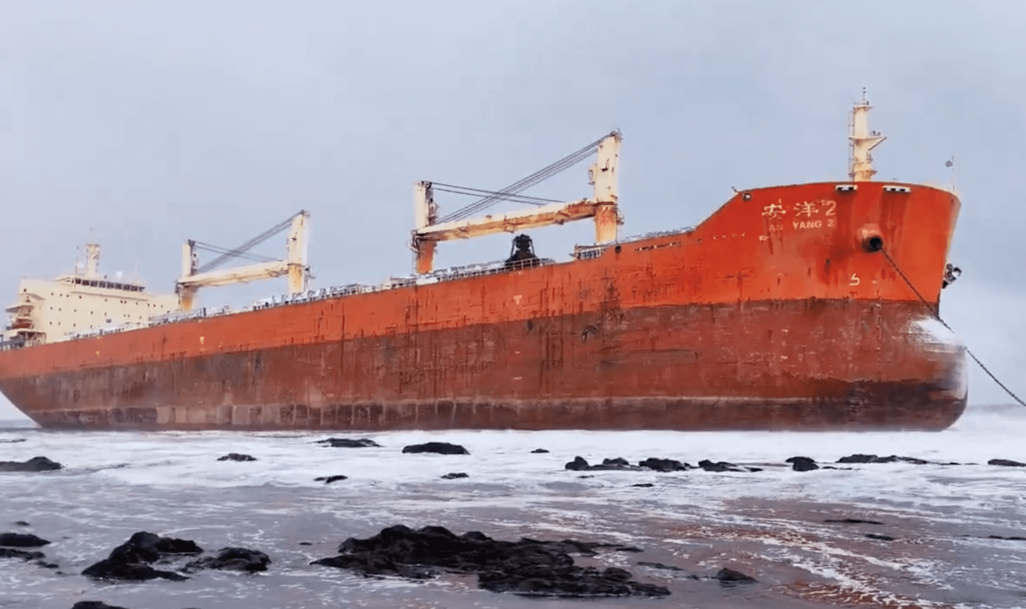 Russia Emergency Services Work to Prevent Oil Spill from Grounded Bulk Carrier