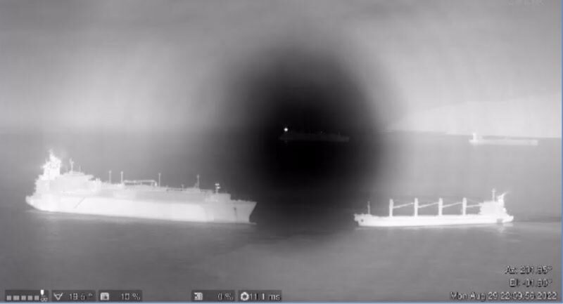 VTS CCTV image showing the wind conditions and 'ADAM LNG's anchor cable prior to the collision