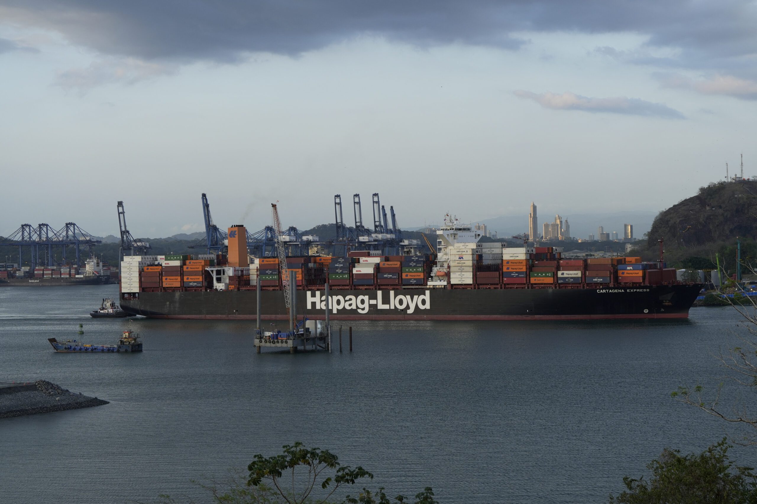 A cargo ship sails through the Panama Canal