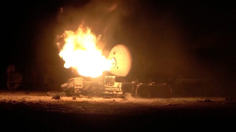 A fuel tank burns following, what Al Masirah TV said, was a U.S. strike on the Ras Isa fuel port, Yemen, in this screengrab from a handout video
