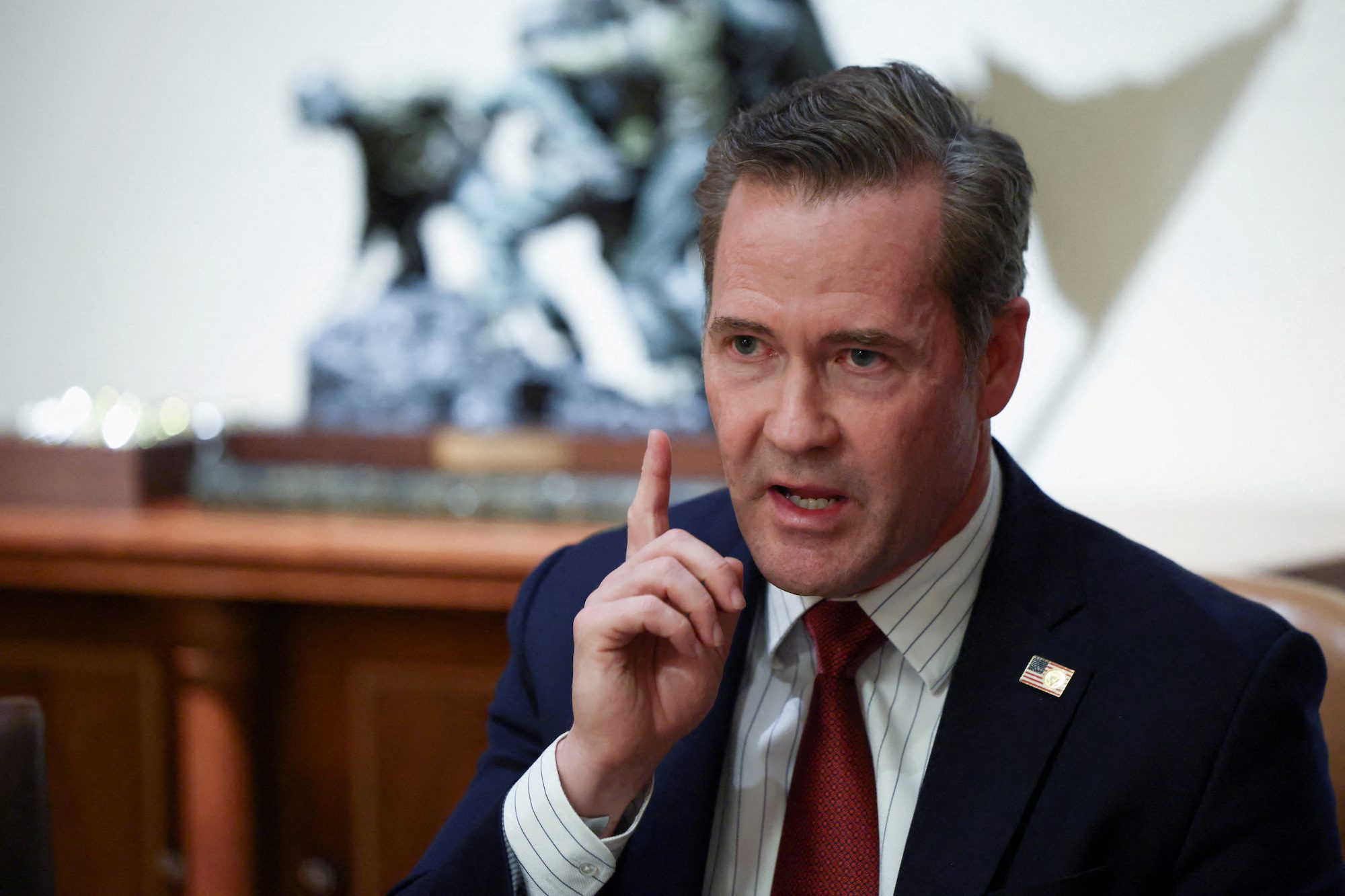 U.S. National Security Advisor Mike Waltz gestures on the day U.S. President Donald Trump delivers remarks at the White House in Washington, D.C.